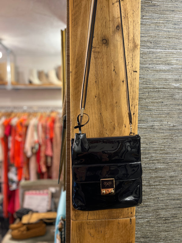 Anya Hindmarch navy patent across the body handbag