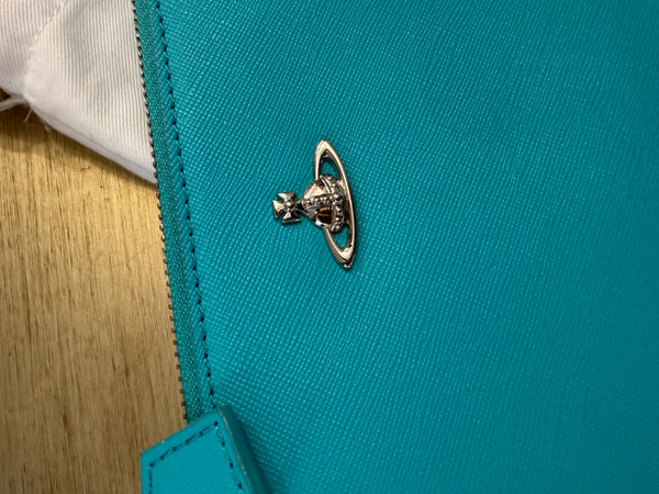Vivienne Westwood turquoise wristlet- clutch