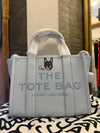 Marc Jacobs pale blue bag featuring Coco the Chihuahua