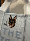 Marc Jacobs pale blue bag featuring Coco the Chihuahua