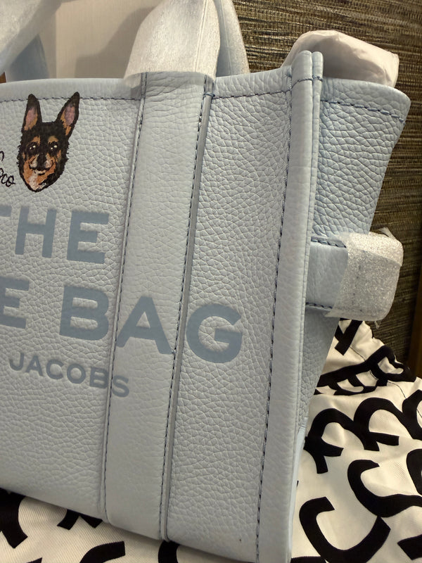 Marc Jacobs pale blue bag featuring Coco the Chihuahua