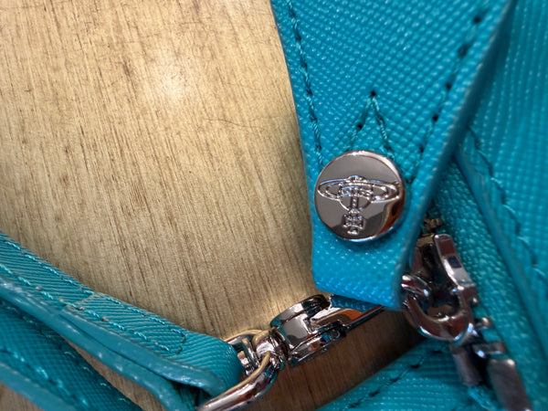 Vivienne Westwood turquoise wristlet- clutch