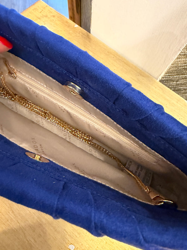 Parodox royal blue suede clutch bag