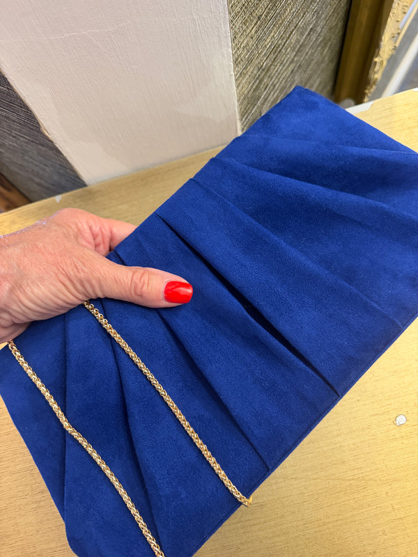 Parodox royal blue suede clutch bag