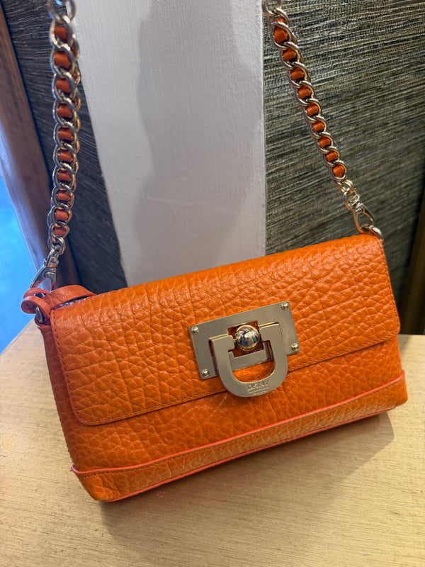 DKNY printed leather orange handbag/clutch